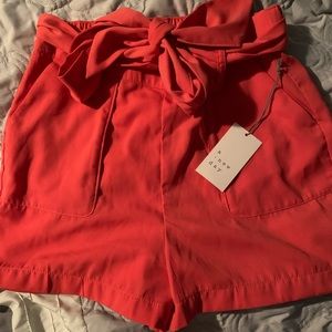 Coral tie waist shorts